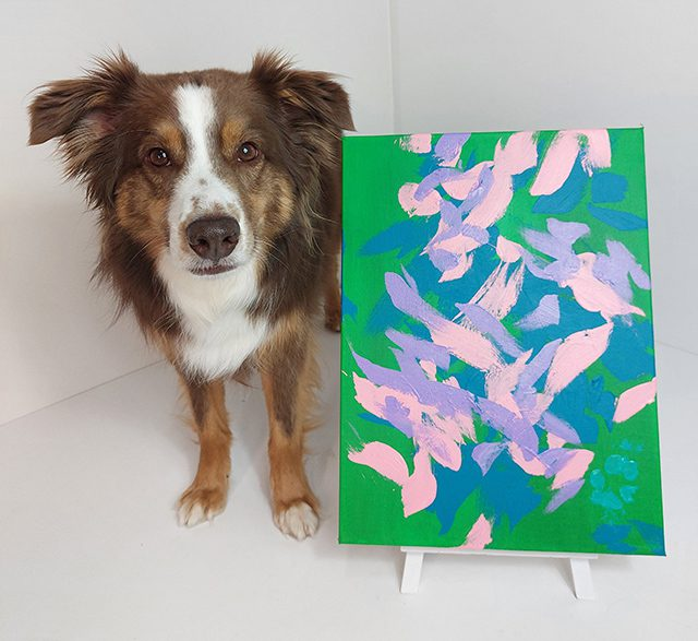 Rogan paints for the 2023 Tripawds Dog Art Auction