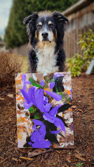 Cody paints for the 2023 Tripawds Dog Art Auction